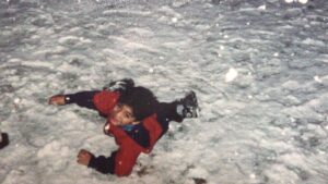 Young Oscar playing in the snow